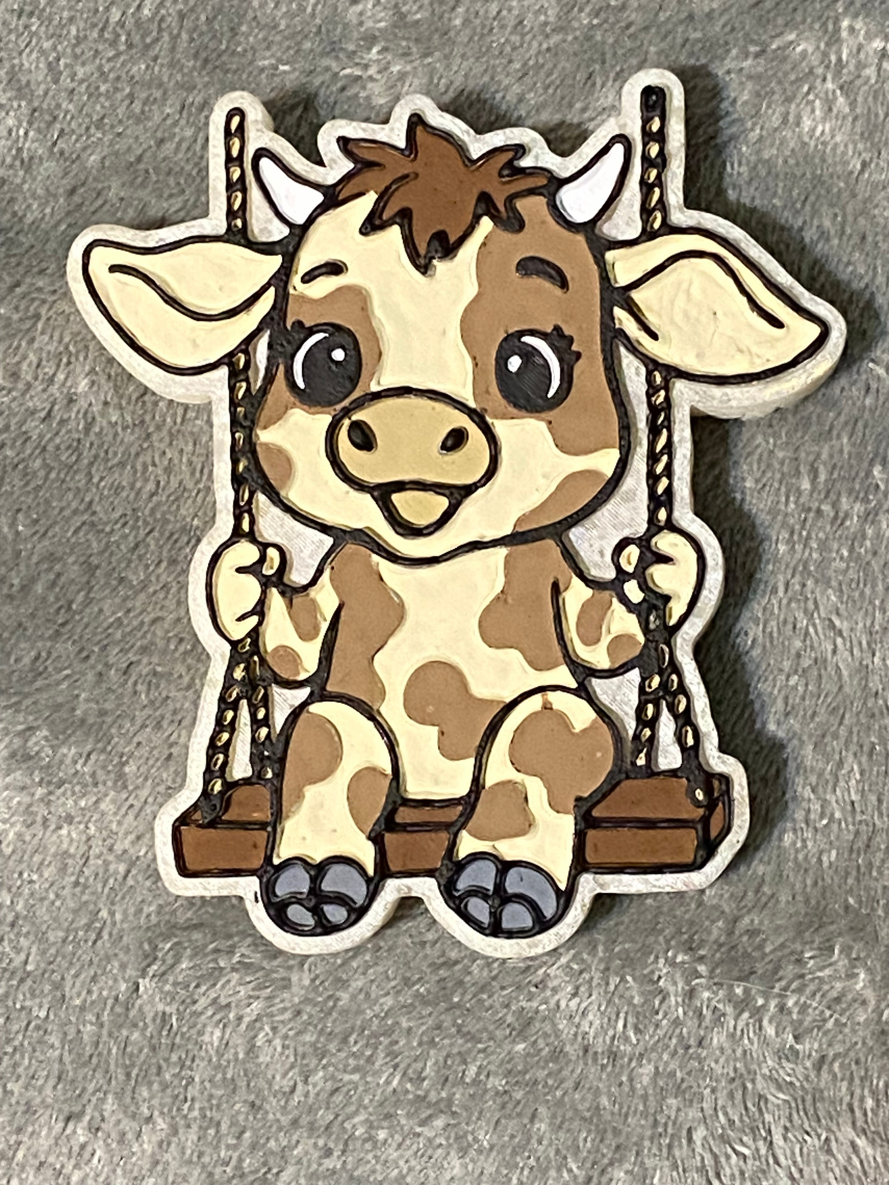 Spotted Cow On Swing